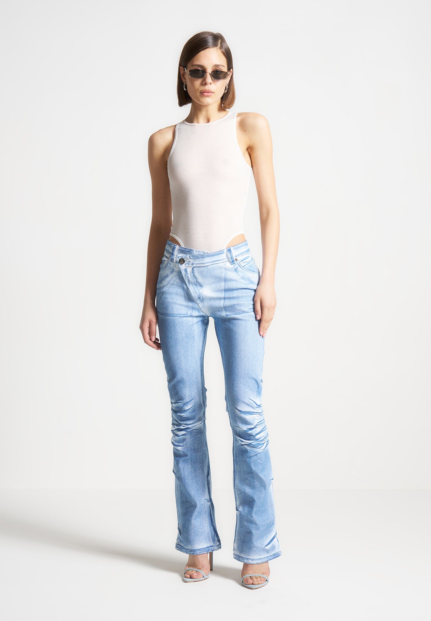 White & Blue Denim Flare Jeans with Tacked Detailing | Manière De Voir