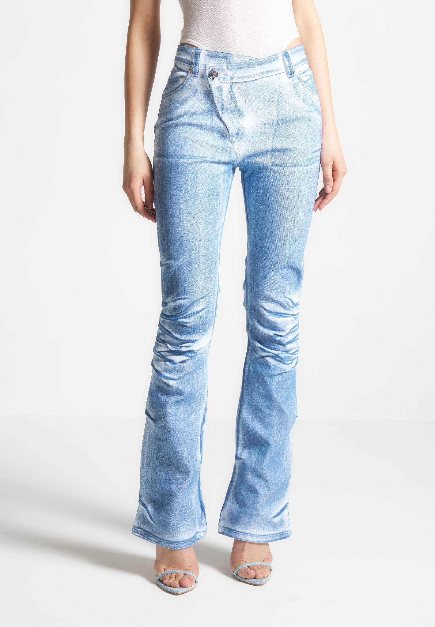 White & Blue Denim Flare Jeans with Tacked Detailing | Manière De Voir
