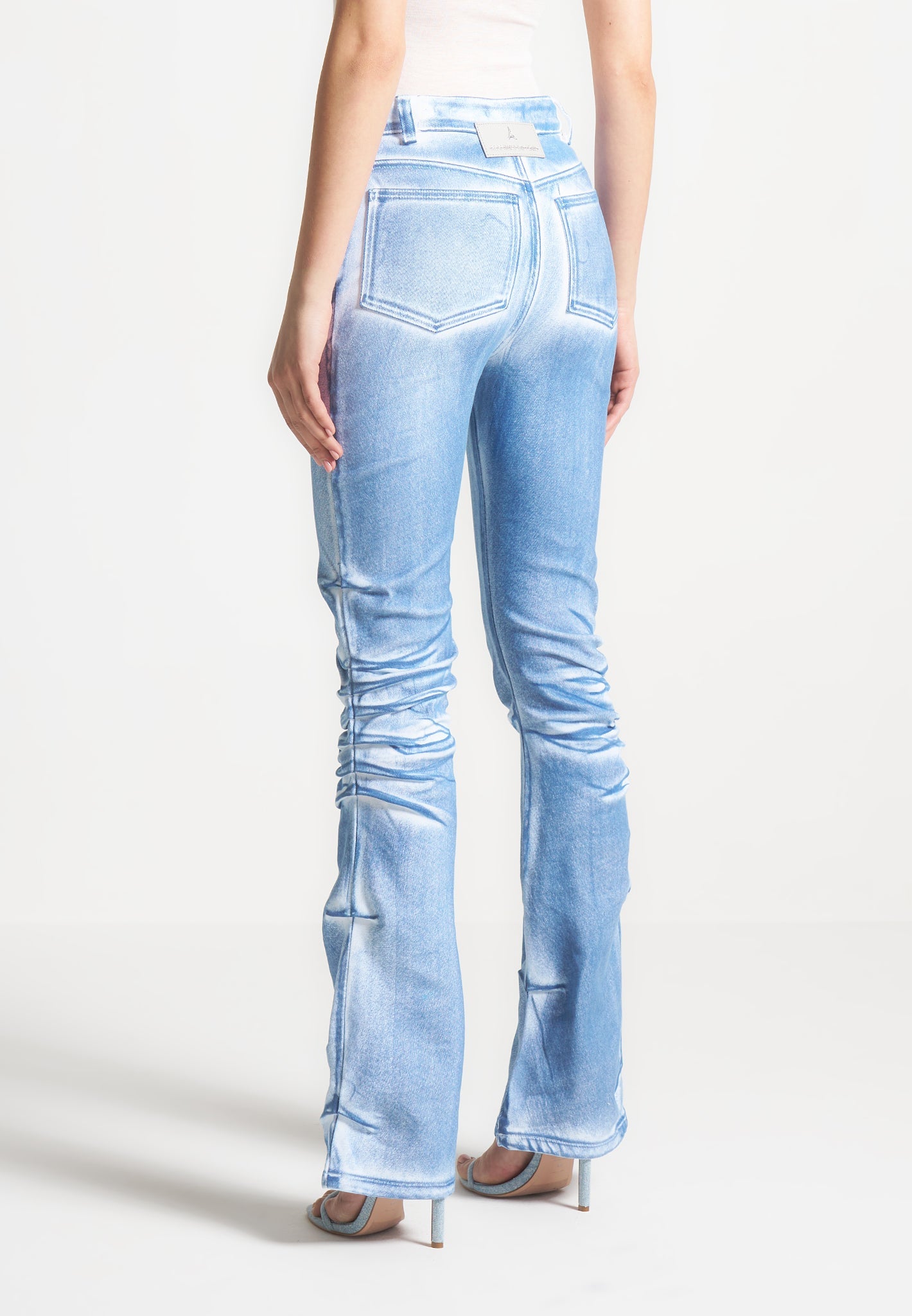 White & Blue Denim Flare Jeans with Tacked Detailing | Manière De Voir