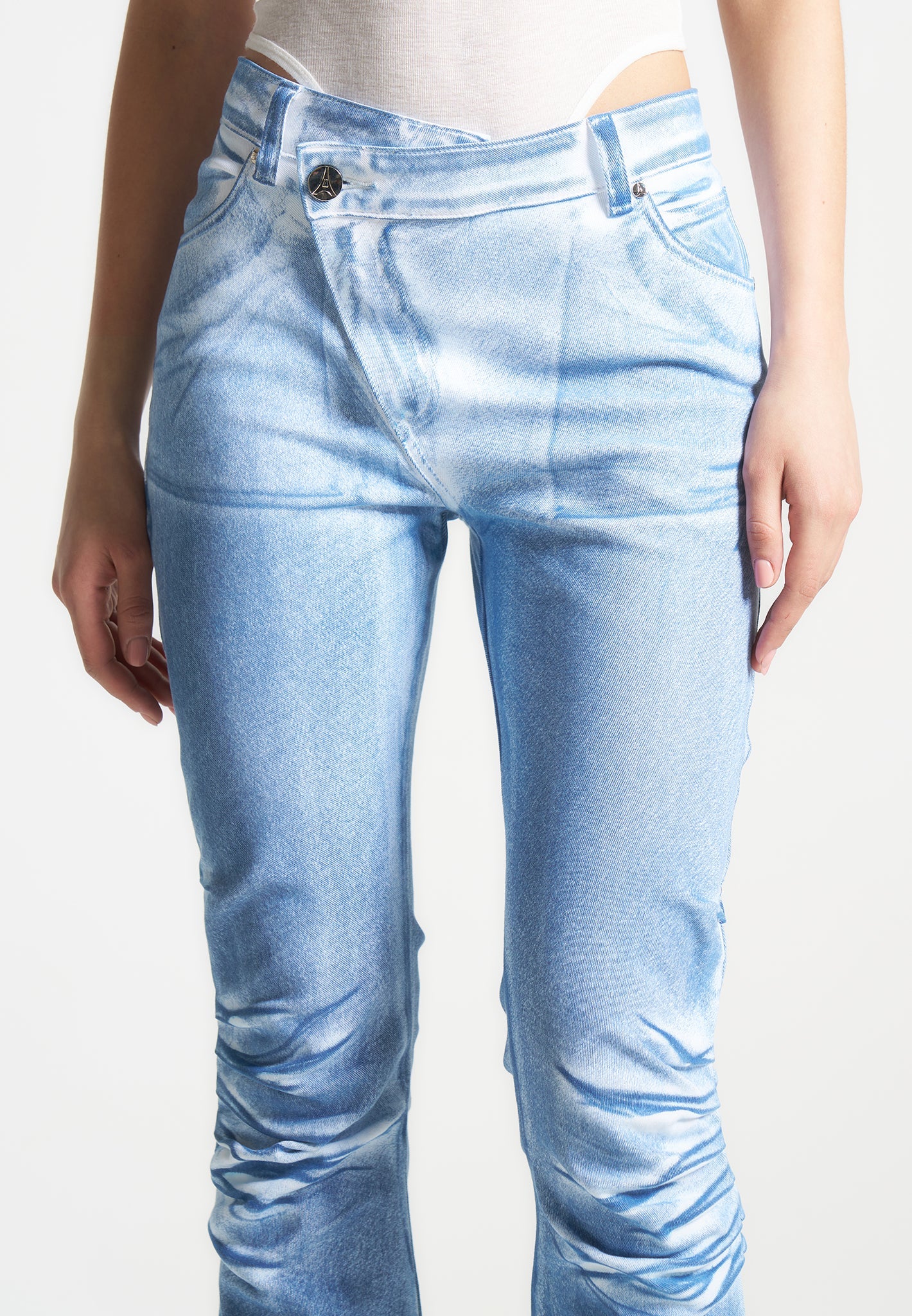 White & Blue Denim Flare Jeans with Tacked Detailing | Manière De Voir