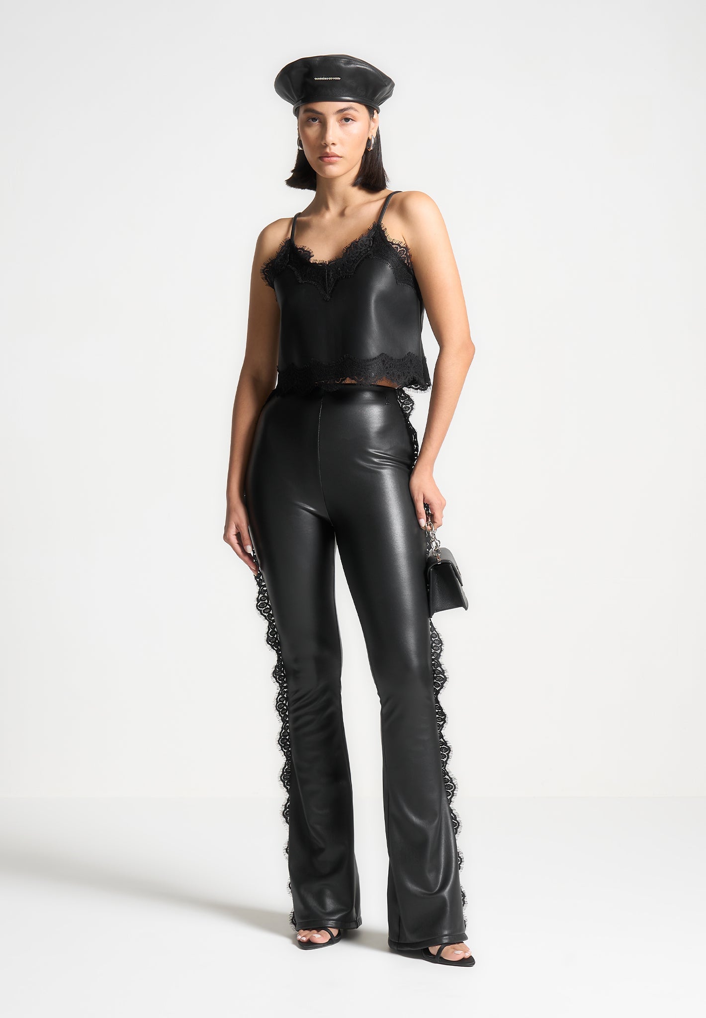 Black Vegan Leather Leggings with Lace Trim & Flare Leg | Manière De Voir