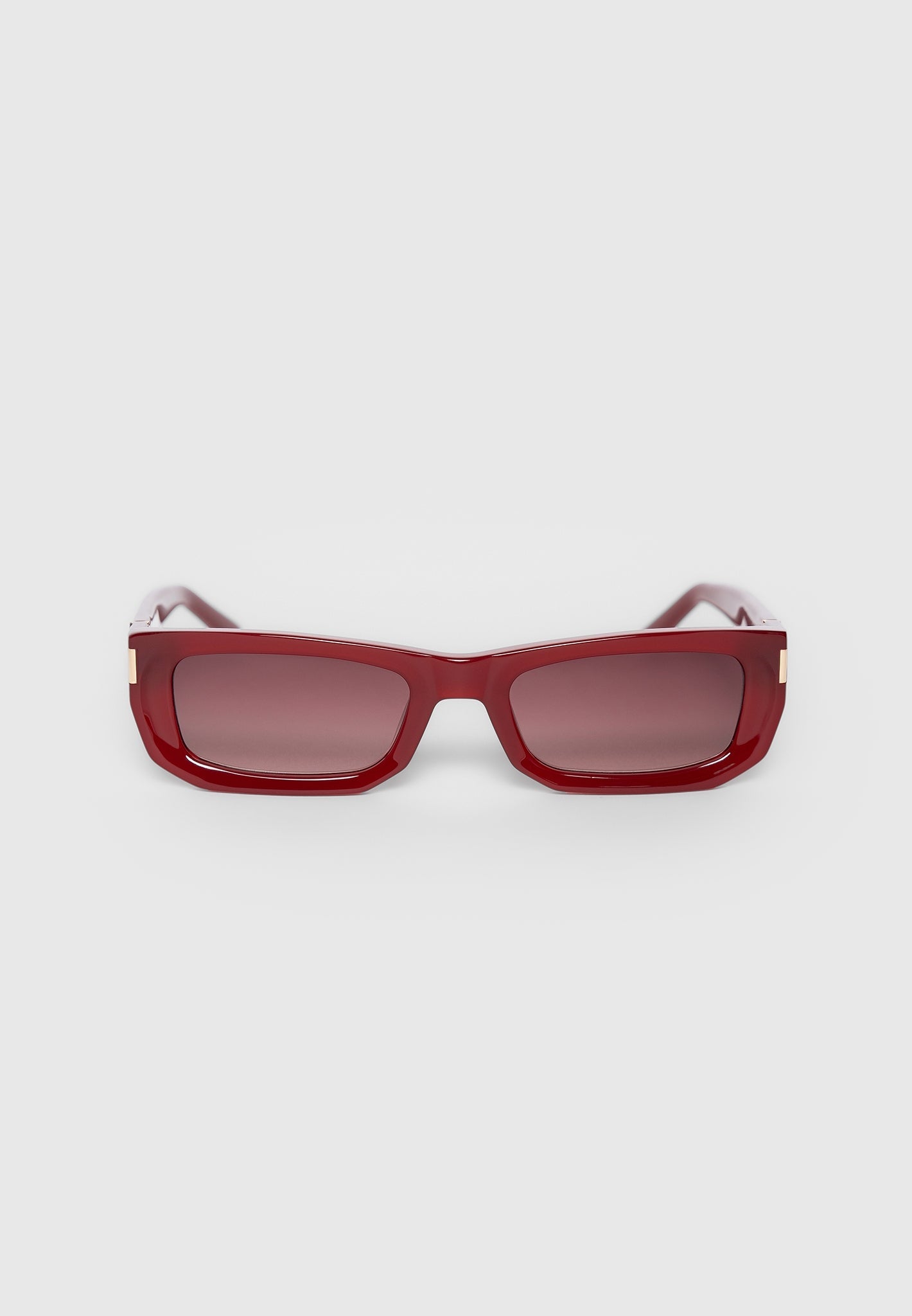 Red Curved-Frame Sunglasses with UV Protection | Manière De Voir