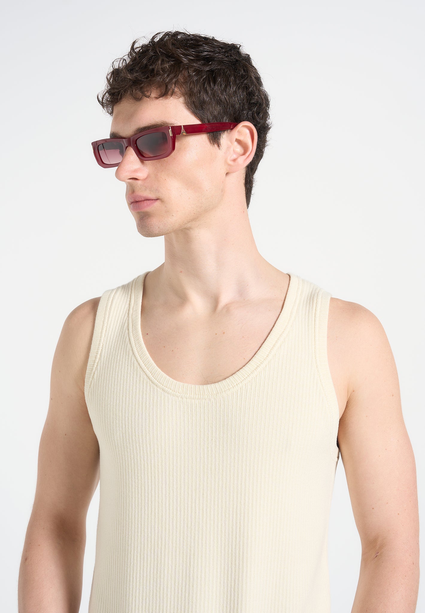 Red Curved-Frame Sunglasses with UV Protection | Manière De Voir