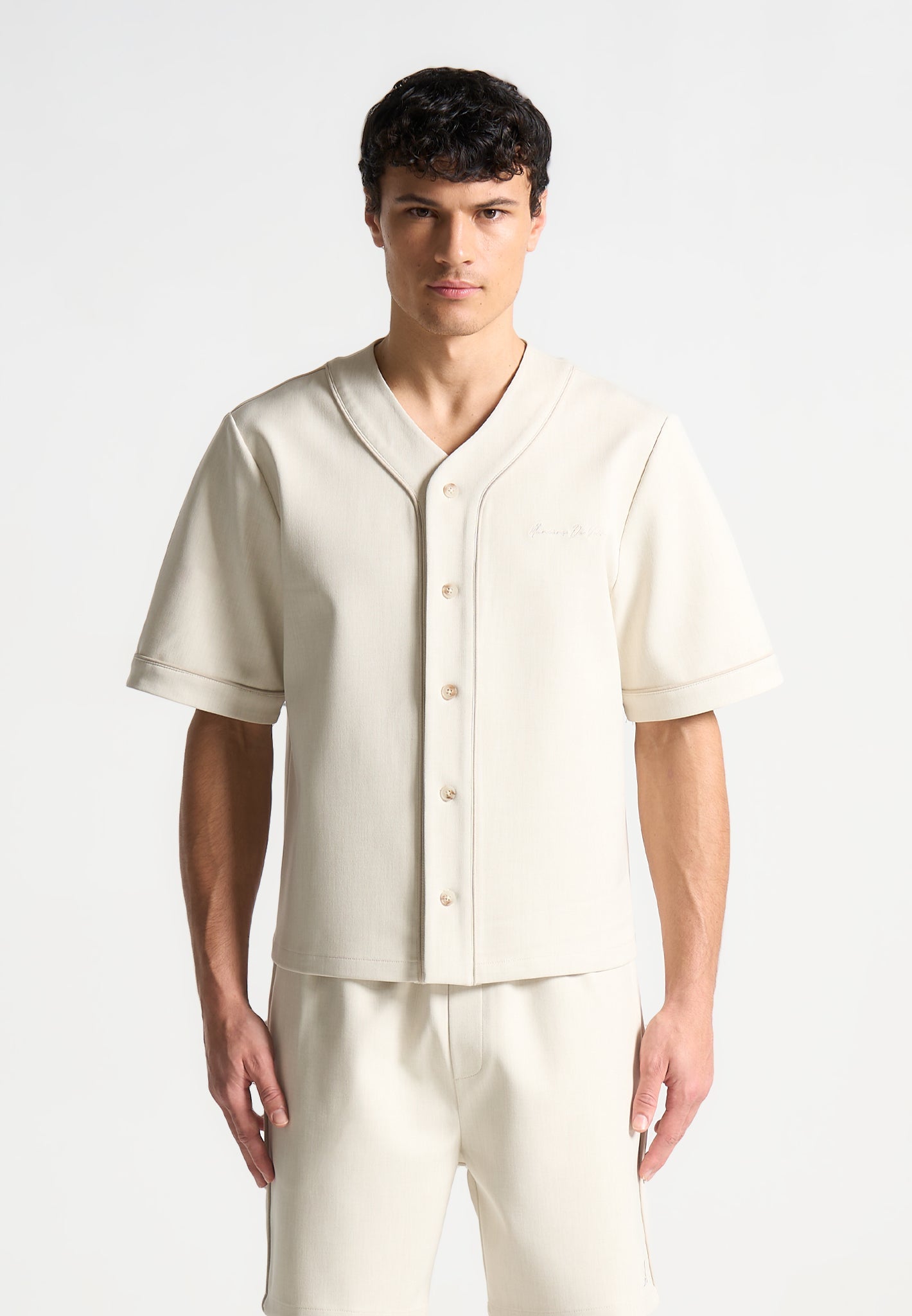 Boxy Baseball Shirt with V-Neck & Contrast Embroidery | Manière De Voir