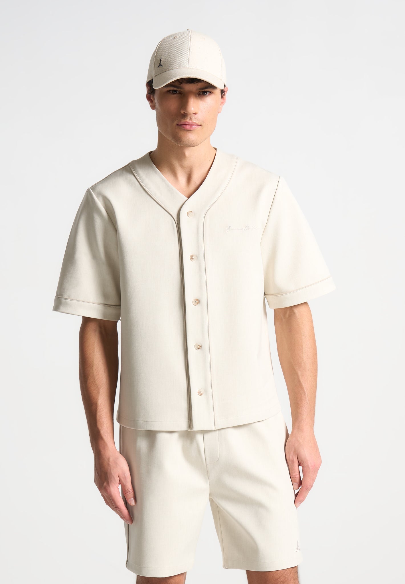 Boxy Baseball Shirt with V-Neck & Contrast Embroidery | Manière De Voir